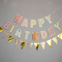 Boy and girl baby one-year birthday party flag decorated childrens party letter pull flower background wall scene layout