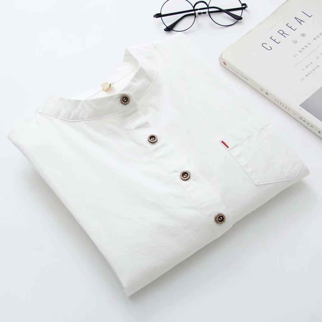 2019春季新款韩版女装前短后长上衣立领套结纯色单口袋翻卷袖衬衫