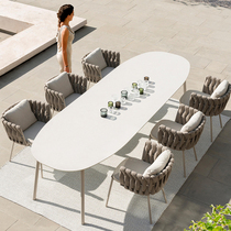 Outdoor table and chair combination courtyard villa balcony chair designer hotel outdoor garden homestay high-end rattan table and chair