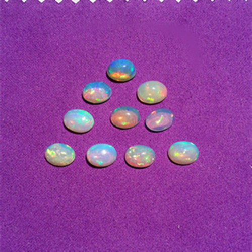 限时抢购正品纯天然欧泊裸石戒面吊坠蛋面椭圆型迷人火彩好批发价_7折