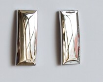 U.S. Metal Badge U.S. Lead Lieutenant Rank A pair of silver epaulettes and collars