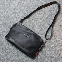 New mens shoulder bag Korean version of the tide waterproof nylon oblique cross-bag fashion mens and womens casual small backpack hand grab bag