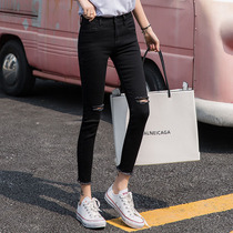 Knee broken hole jeans womens fury edge ankle-length pants Korean version of irregular tassel slimming pants pencil womens pants