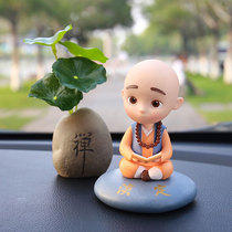  Net celebrity A Zen little monk car interior decoration Buddha car son shaking his head creative personality car decoration