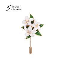 sumni Samini European and American style 18K gold gold enamel drop glaze white flower green leaf brooch female