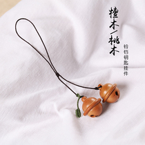 Personality creative peach sandalwood Bell car keychain pendant men and women mobile phone bag hanging jewelry handmade key chain
