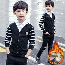 Boy wears a striped T-shirt and two warm shirts with a boys jacket