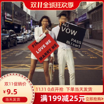 Street photography fashion couple hand holding board travel location wedding photography props red and black English font board gift box ornaments