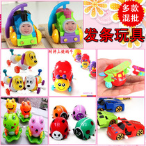 Baby stalls exploding creative cartoon on the chain flip bucket small toys clockwork toys childrens creative toys