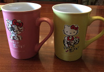 A pair of Kitty Hello Kitty 2013 Colgate Ceramic Cups