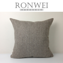 Model room sofa red brown pillow black and white herringbone pattern dark pattern cotton and linen pillow Office bag