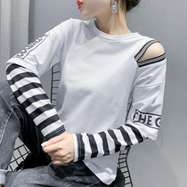 European station Ocnltiy long-sleeved t-shirt womens 2021 spring new foreign style fake two loose striped stitching top