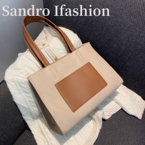 Hong Kong large capacity bag womens 2021 New Wild retro simple shoulder bag commuter tote bag mobile phone bag