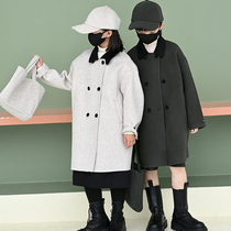 Childrens clothing in autumn and winter clothing with trendy wool coat boys and girls with a babys hair girl