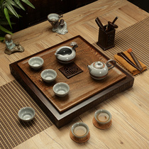 Whole piece of chicken wing wood tea tray Purple sand tea set Household Ge Kiln ceramic teapot Solid wood tea sea square stone tea table