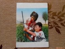 An old picture piece of a child and a child 50s