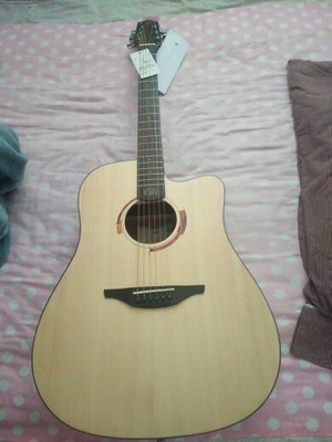 大家谈谈【真相】nightwish拉维斯吉他怎么样，是杂牌吗，音质如何