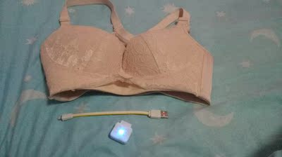 充电快，内衣里面设计像小点的纹理，按摩时感觉热热的，随时随地都能按摩，晚上睡觉按摩，走路按摩。