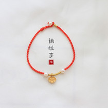 Taoyuan Li original 999 gold hard gold Ji character ancient style natural freshwater pearl recruitment Cai Nafu red rope bracelet