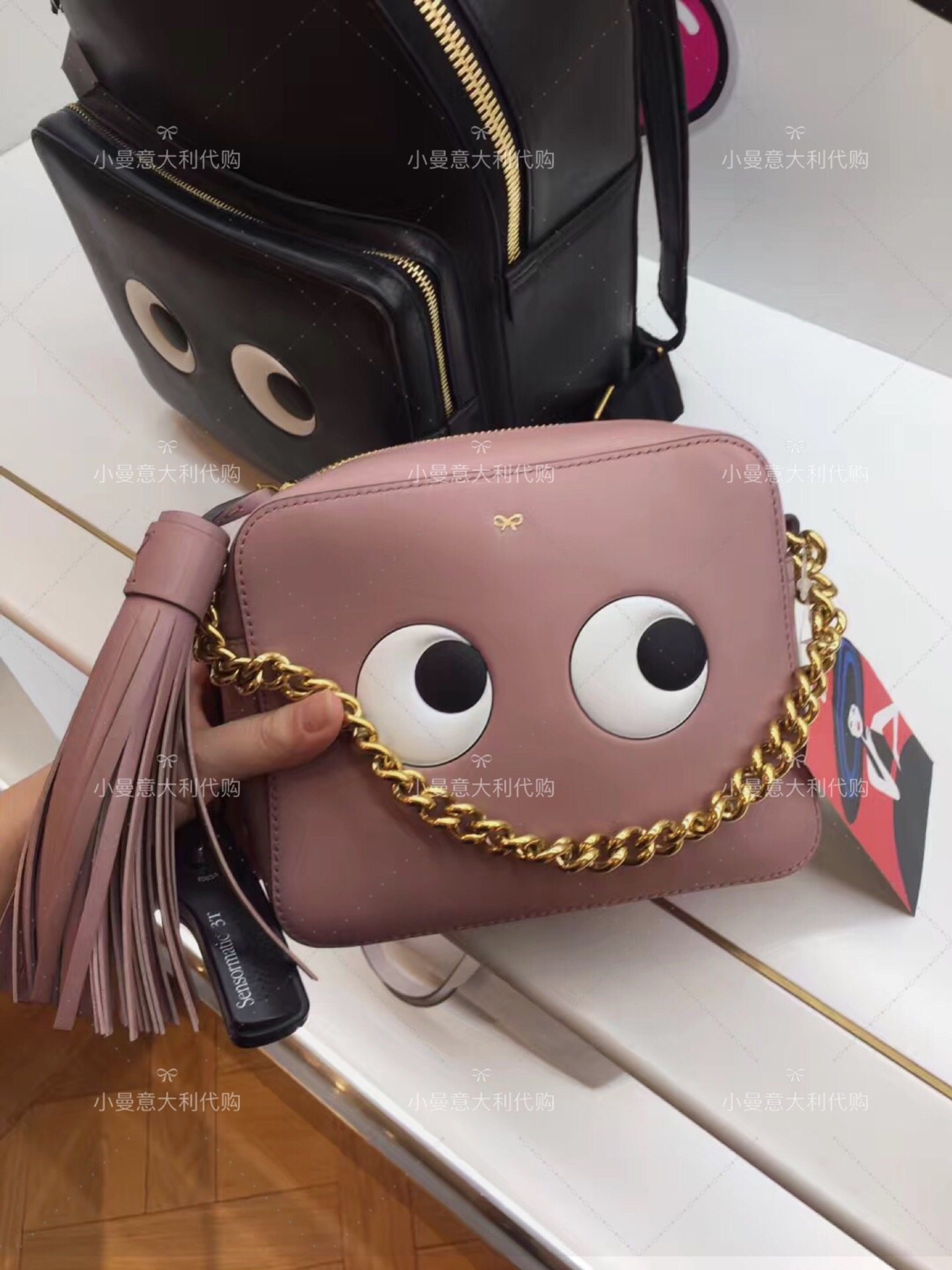 小曼意大利代购anya hindmarch安雅包女手拿单肩斜挎包流苏_7折现价