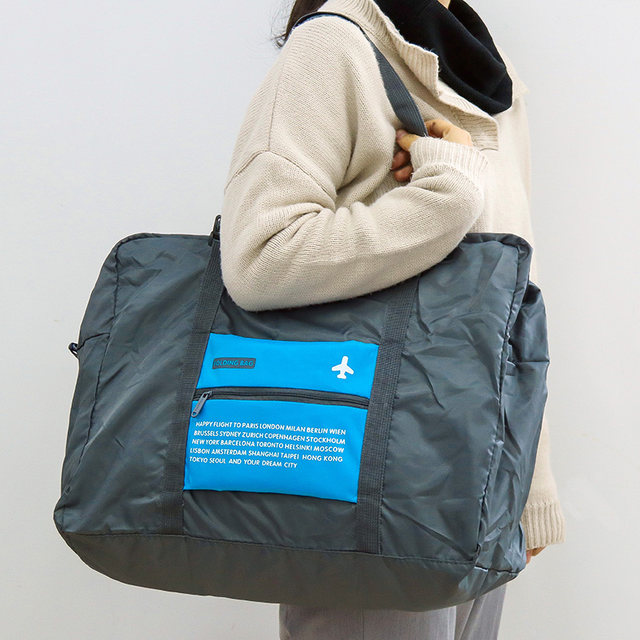 Foldable travel bag, portable duffel bag, female high-capacity boarding bag, short-distance travel bag, male waterproof sleeve trolley case Foldable travel bag, portable duffel bag, female high-capacity boarding bag, short-distance travel bag, male waterproof sleeve trolley case
