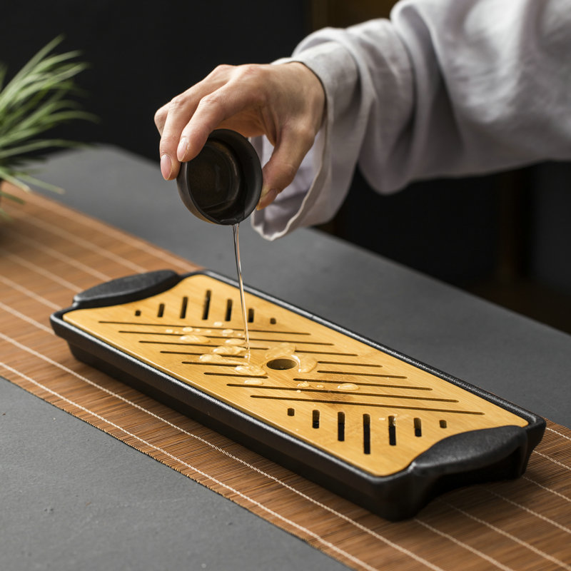 Japanese coarse pottery kung fu tea tray zen jet dry terms plate of black pottery tray type dry mercifully tea accessories bamboo storage units