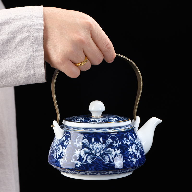 Recreational product is blue and white porcelain household ceramics coppering. As sterling silver 999 girder pot of tea cup teapot suits for bamboo tea tray tea set