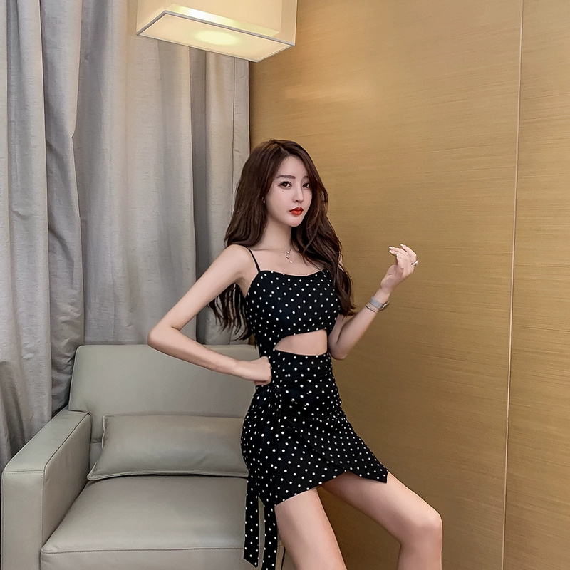 Váy chấm bi 2021 mùa hè sexy rò rỉ bụng cao eo không thường xuyên túi hông sling váy ngắn hộp đêm quần áo phụ nữ - Váy eo cao