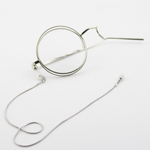 The second element strange thief Kidd with the same monocle retro style British single only half a single border myopia has a degree