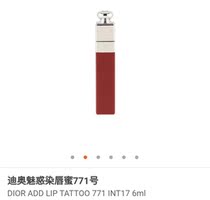 The Dior is enchanting with the glazed lips.