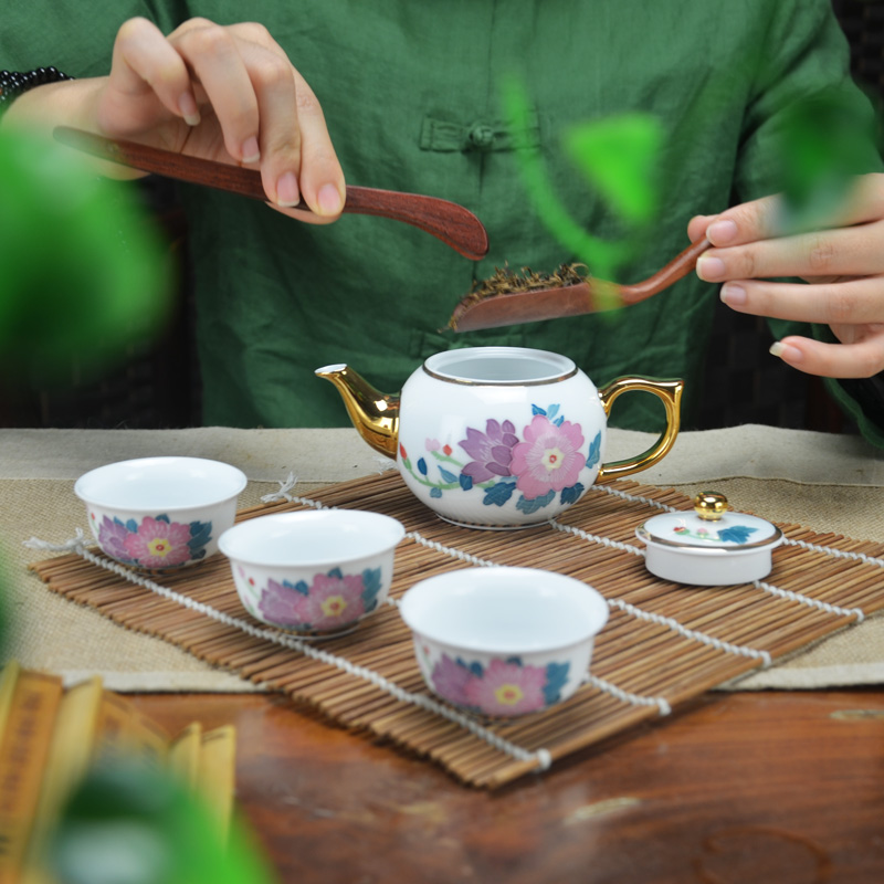 A complete set of new ceramic kung fu tea set under the glaze color hand - made teapot gift six cups of tea