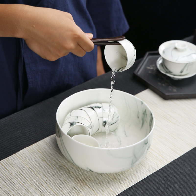 TaoMingTang kung fu tea set suit household contracted blue and white porcelain ceramic white porcelain tea set. A complete set of tea cups