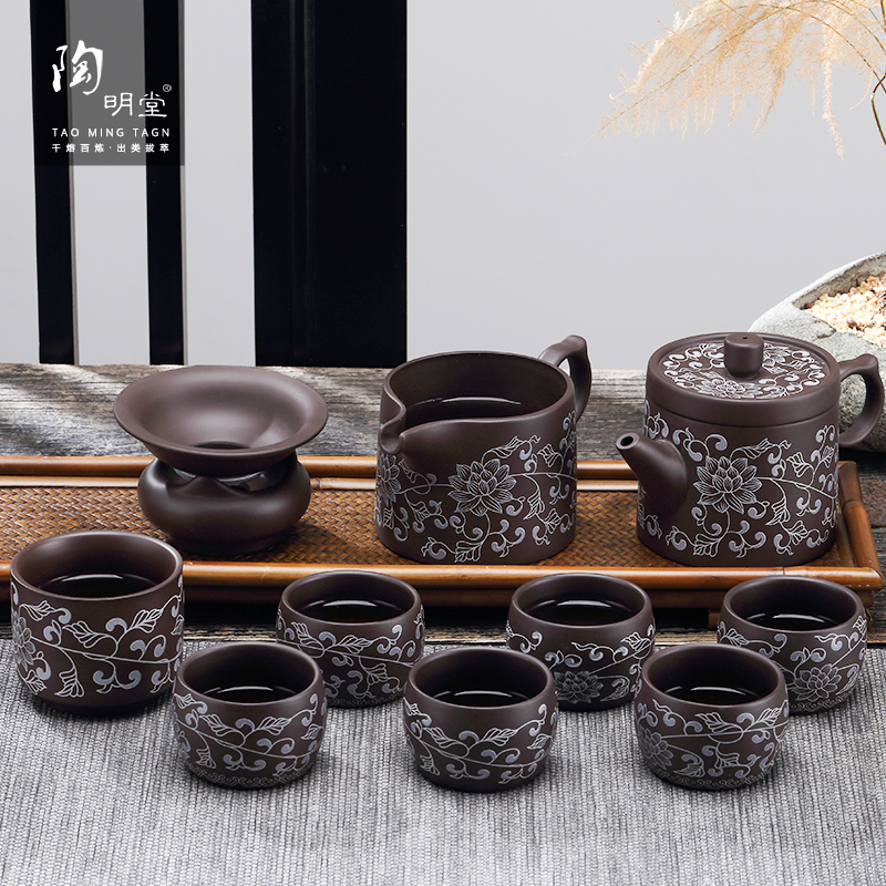 TaoMingTang violet arenaceous kung fu tea set suit household ceramic tea cup tea tea is a complete set of manually