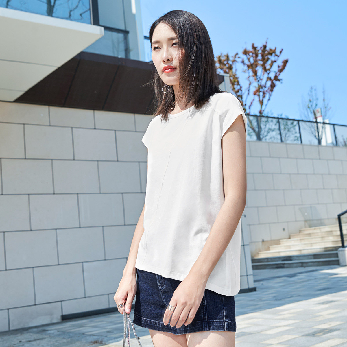 对白不规则纯色圆领无袖t恤女 2017夏装新款时尚简约宽松棉质上衣