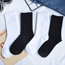 Middle waist socks female tide Korean version of the net red long white men and women movement wild college wind solid color black and white socks