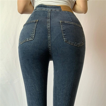 Summer European and American thin ultra-high waist irregular personality burr jeans womens tight hips dark trousers
