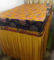 The Buddha Hall is decorated with a table of tables and tables.