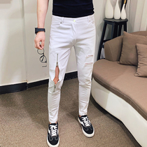 Trendy handsome white ripped jeans men slim slim feet pants Korean version of thin fashion zipper trousers