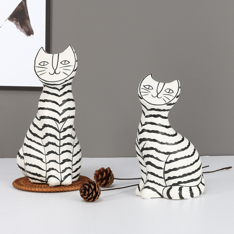 I and contracted ceramic flat face cat sitting room porch place black and white stripe household adornment the example room floor