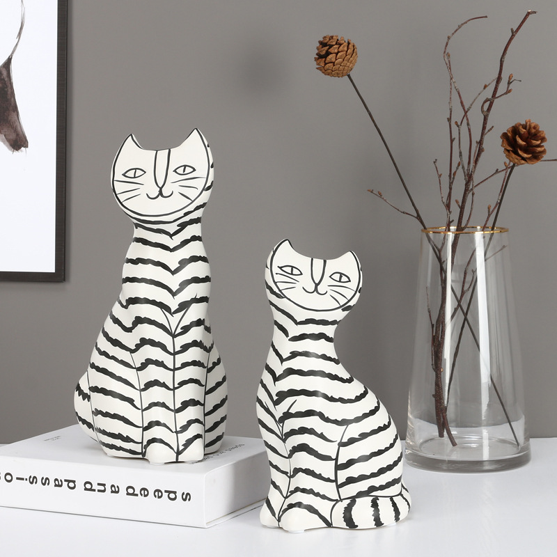 I and contracted ceramic flat face cat sitting room porch place black and white stripe household adornment the example room floor