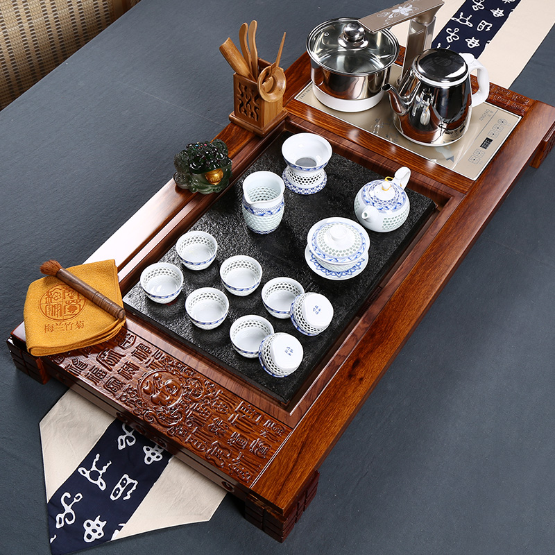 Hua limu tea tray was kung fu tea set four unity induction cooker ceramic cups of a complete set of home office suite