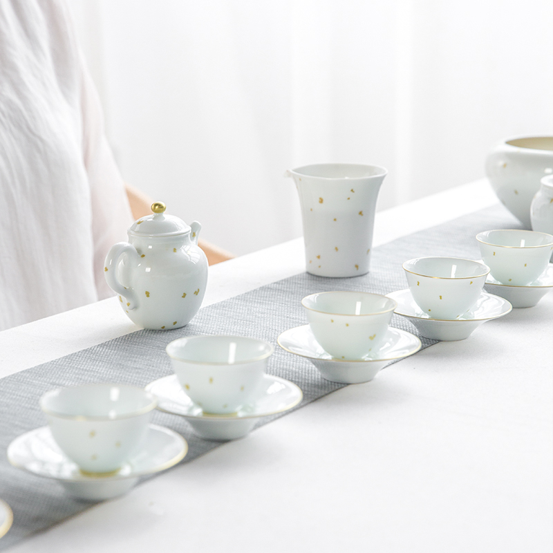 The Escape this fair hall ceramic cup) suit white porcelain points tea tea filter remove a cup of tea and a cup of sea kunfu tea accessories