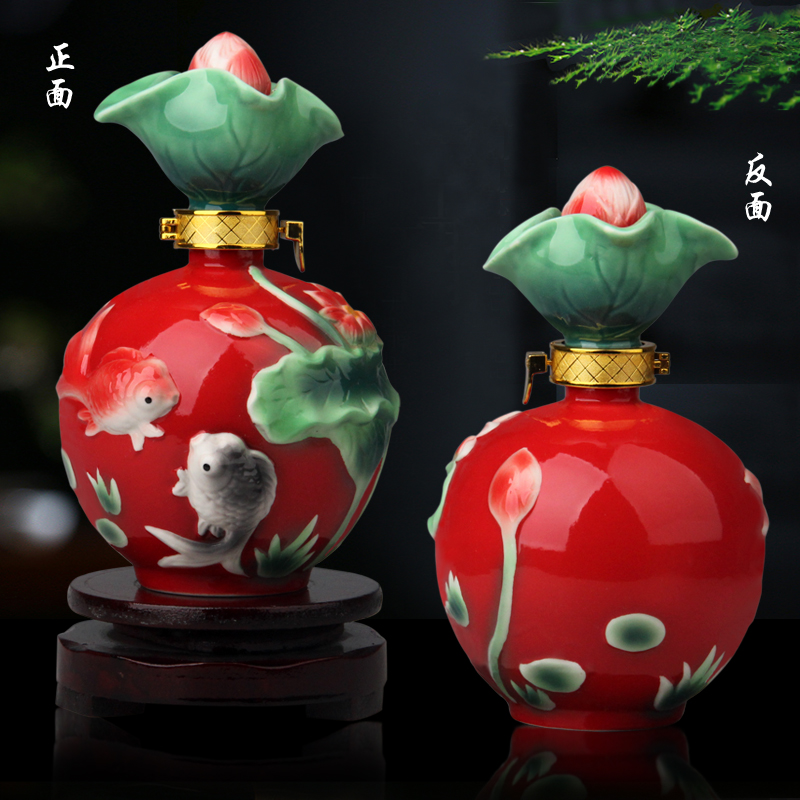 Jingdezhen ceramic 1 catty outfit colored enamel lotus fish a kilo of empty bottles jars liquor pot from year to year