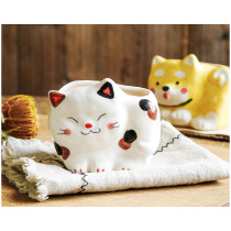 A cat and dog imported from Japan Seto burn Cute ceramic flower decoration home storage rice spoon rack gift