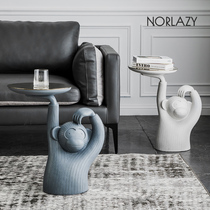 Designer sofa side a few Nordic light luxury creative Monkey coffee table Small apartment model room simple cement headboard A few
