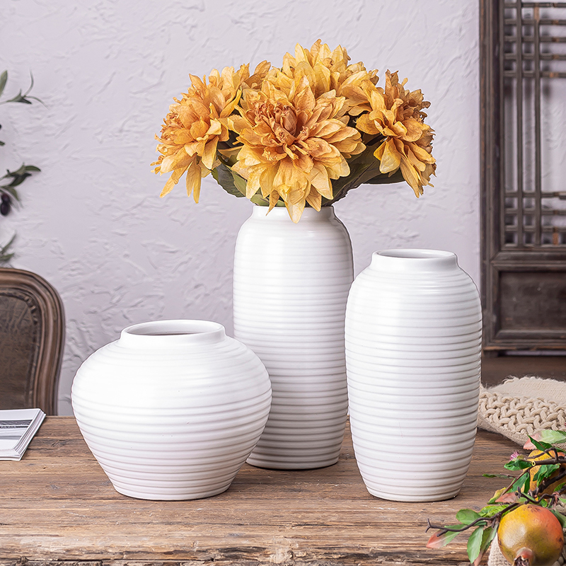 The white ceramic hydroponic bottle Jane modern Nordic furnishing articles living room flower arrangement table dry flower vase suits for