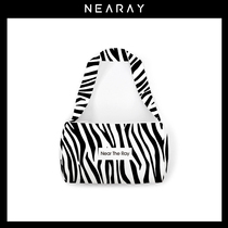 Nirui niche design zebra canvas bag women custom zebra pattern underarm bag retro cylinder shoulder bag