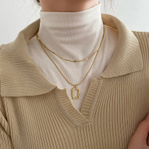Sweater chain long 2021 new autumn and winter high-end double-layer light luxury niche necklace female clavicle chain tide net red