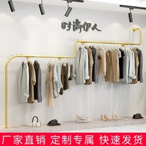 Upper wall display shelves clothing store display shelves walls of childrens clothing store walls with gold hanging rack