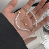 Korean bow pearl bracelet female ins niche design simple High sense light luxury girlfriends fairy duo